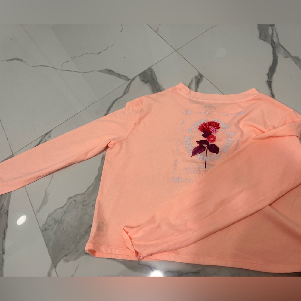 long sleeve orange pink shirt with design